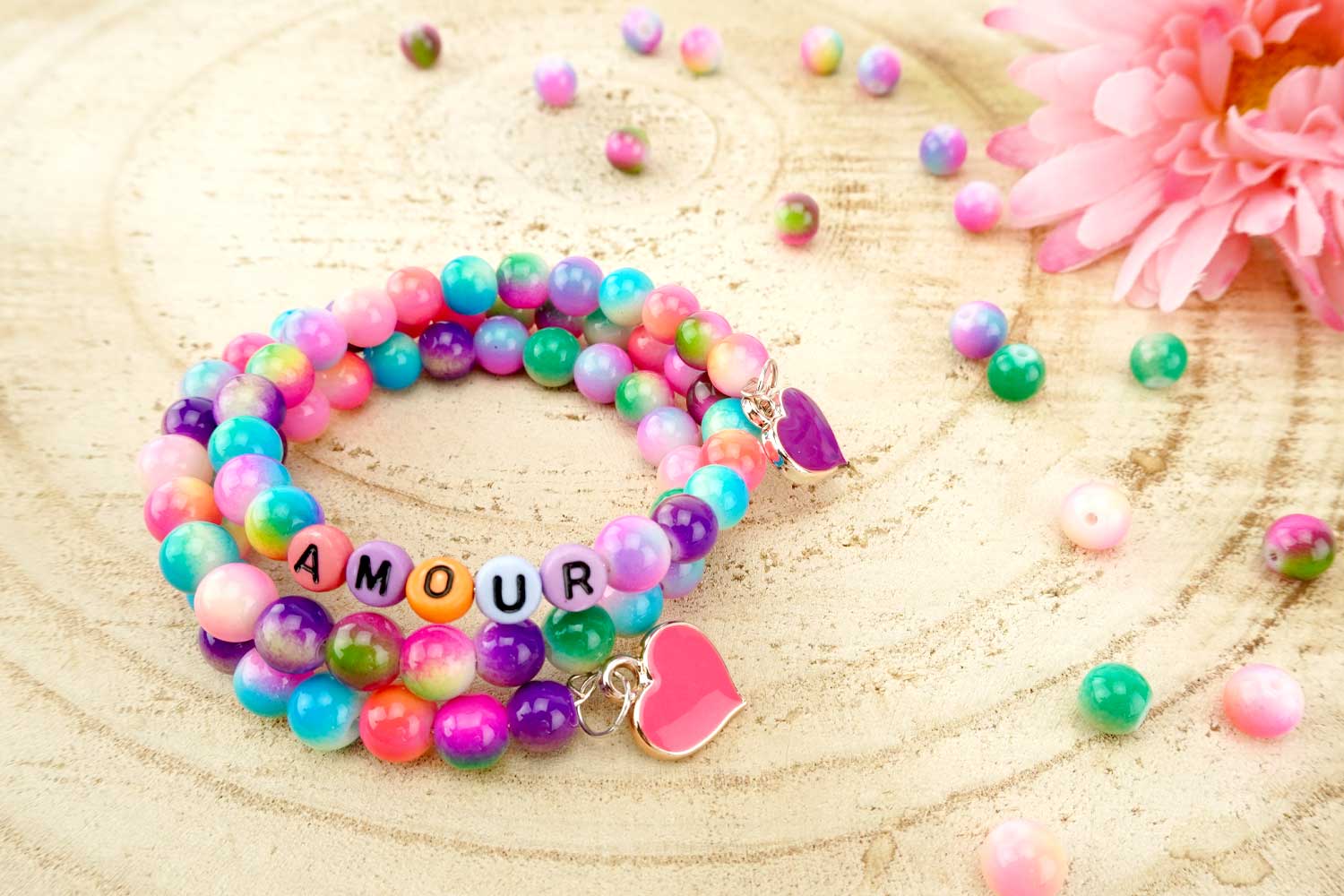 Pulseras "AMOR" perlas arcoíris