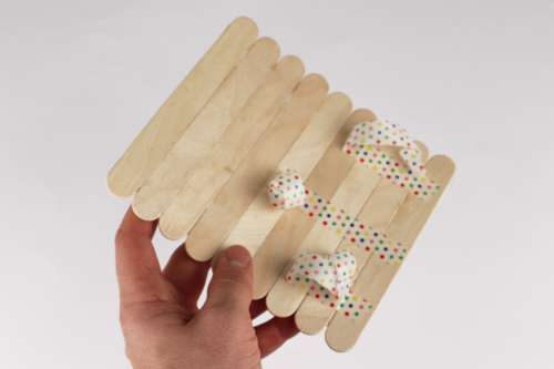 Rompecabezas de fotos con palitos de madera