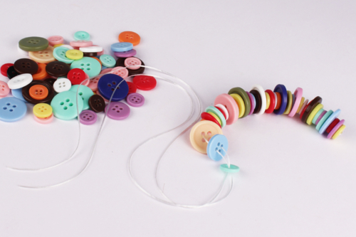 Fabricar una oruga con botones