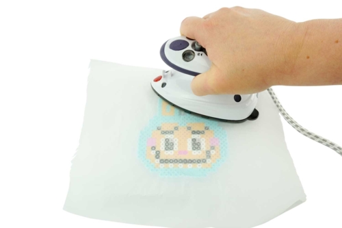 Paso 5: Fijar las cuentas con la plancha - 